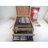 An unused Bizili Art & Craft 150 piece deluxe portable art chest containing acrylic, watercolour,