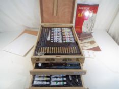 An unused Bizili Art & Craft 150 piece deluxe portable art chest containing acrylic, watercolour,