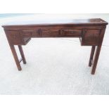 A good quality fruitwood four drawer side table 92 cm x 146 cm x 28 cm