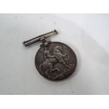 A World War One (WW1) medal inscribed 14