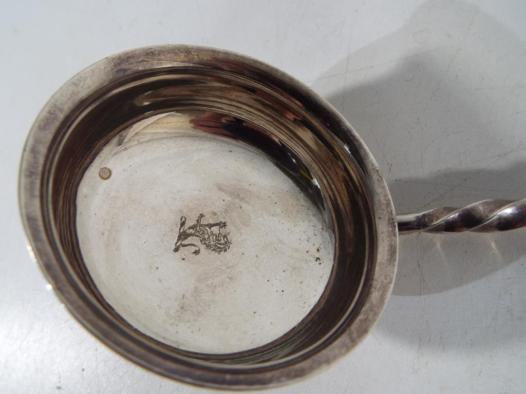 A silver punch ladle with inscribed lion - Image 2 of 2