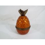 A vintage Evans enamelled table lighter in the form of a pineapple Est £20 - £30