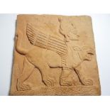 A ceramic tile depicting a mythical winged creature (possibly Lamassu) 10 cm x 10 cm