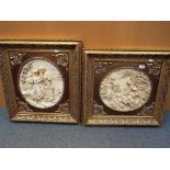 2 resin pictures depicting a couple in a gilt frame,