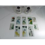 Six hand painted glass panels predominantly depicting Japanese ladies,