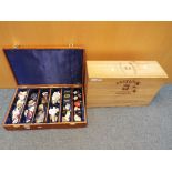 Breweriana - a lined wooden case containing a quantity of whisky bottle pourers,