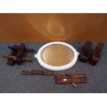 A small quantity of antique and vintage woodworking tools and a ceramic framed wall mirror by