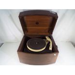 A vintage Pye mahogany cased record player with Collaro turntable,