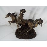 A bronze effect figurine depicting three galloping horses approx 32cm (h) Est £20 - £40