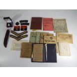Lot to include a quantity of World War II ephemera to include identity cards, ration books,