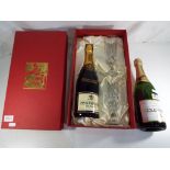 Champagne - A bottle of Piper - Hedidsieck Brut Extra in presentation box containing two glasses