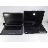 An E Machines E525 160 gb laptop and a HP laptop (2)