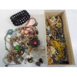 A good mixed lot of costume jewellery to include bangles,