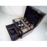 A lady's Victorian travelling vanity set in fitted case with stringing,