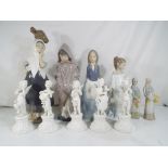 Four Nao figurines and two similar the largest being 31.