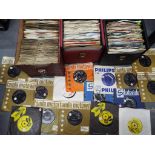 Three carry cases containing a quantity of 45 RPM vinyl records, including Tamala Motown,