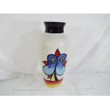 Lorna Bailey - a Lorna Bailey vase decorated with a lakeside design,