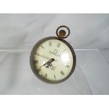 A brass and glass Bulls Eye clock,