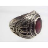 A silver ring, stone set inscribed United States Navy,