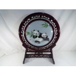 A silk picture depicting Panda Bears set in ornate wooden frame and stand Approximately 55 cm (h)