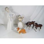 Three Beswick figurines comprising a collie dog and two foals also included in the lot are two Nao