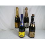 Four bottles of Champagne to include Baron Edouard Masse, Etienne Dumont,