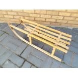 A child's traditional wooden sledge Est £40 - £50