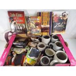 A good mixed lot to include a quantity of vintage collectable beer mats, German stoneware tankards,