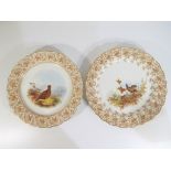 Royal Worcester - A pair of large Royal Worcester scalloped edge plates decorated with game birds,