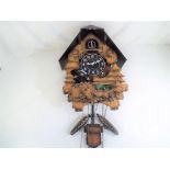 A Cuckoo Clock by Quemex, quartz movement (w/o,