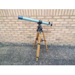 A Prinz Astral 500 telescope on tripod stand,