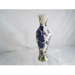 Moorcroft Pottery - a Moorcroft Pottery vase decorated in the Delphinium pattern, approx 20.