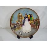 Royal Doulton - A large Royal Doulton 'Biddy Penny Farthing' plate, approximately 25.