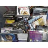 A quantity of CDs to include James Bond themes, Oasis, Abba, Led Zeppelin, Chicago, Queen,