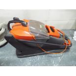 A Flymo Ultraglide electric lawnmower