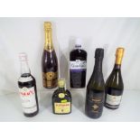 Six bottles of alcoholic beverages to include Gordon's Sloe Gin, Fundador Brandy De Jerez, Pimm's,
