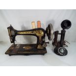 A vintage decorative singer sewing machine model no.