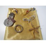 Seven good quality stone set brooches