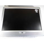 A HP w 20 silver coloured 20 inch monitor with stand and cable,Model No CZT70500CN,