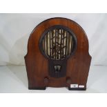 A vintage Philips wood cased radio model R634/15.