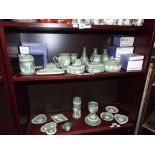 Wedgwood - a large collection of Wedgwood Jasperware, powder green to include vases, plates,