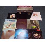 A quantity of 33 rpm vinyl records to include Queen, Elton John, Fleetwood Mac, Simon and Garfunkel,
