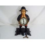 A Bradley & Hubbard styled painted cast metal mantel clock in the form of Napoleon holding the