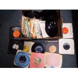 A lot to include a quantity of 45 rpm vinyl records to include The Searches, Louis Armstrong,