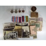 A WWII (World War Two) Defence medal, a War Medal 1939 - 1945,