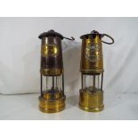 Two miners type safety lamps in brass and metal ,