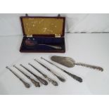 A good lot to include six silver handles button hooks (varying assays),