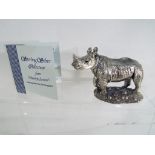 A hallmarked silver depiction of a Rhinosaurus, Birmingham assay,