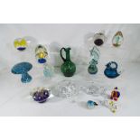 Sixteen pieces of glassware predominantly paperweights