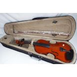 An unused Windsor violin with bow in fitted carry case, length of body 36 cm,